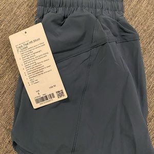 Lululemon track that 3” iron blue shorts